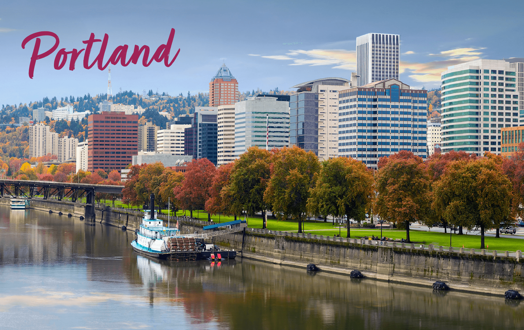 Downtown Portland skyline with modern buildings, autumn trees, and a boat docked on the riverfront. “Portland” in cursive at the top left highlights the city’s charm—a perfect setting to imagine hosting a Legal Week Conference.