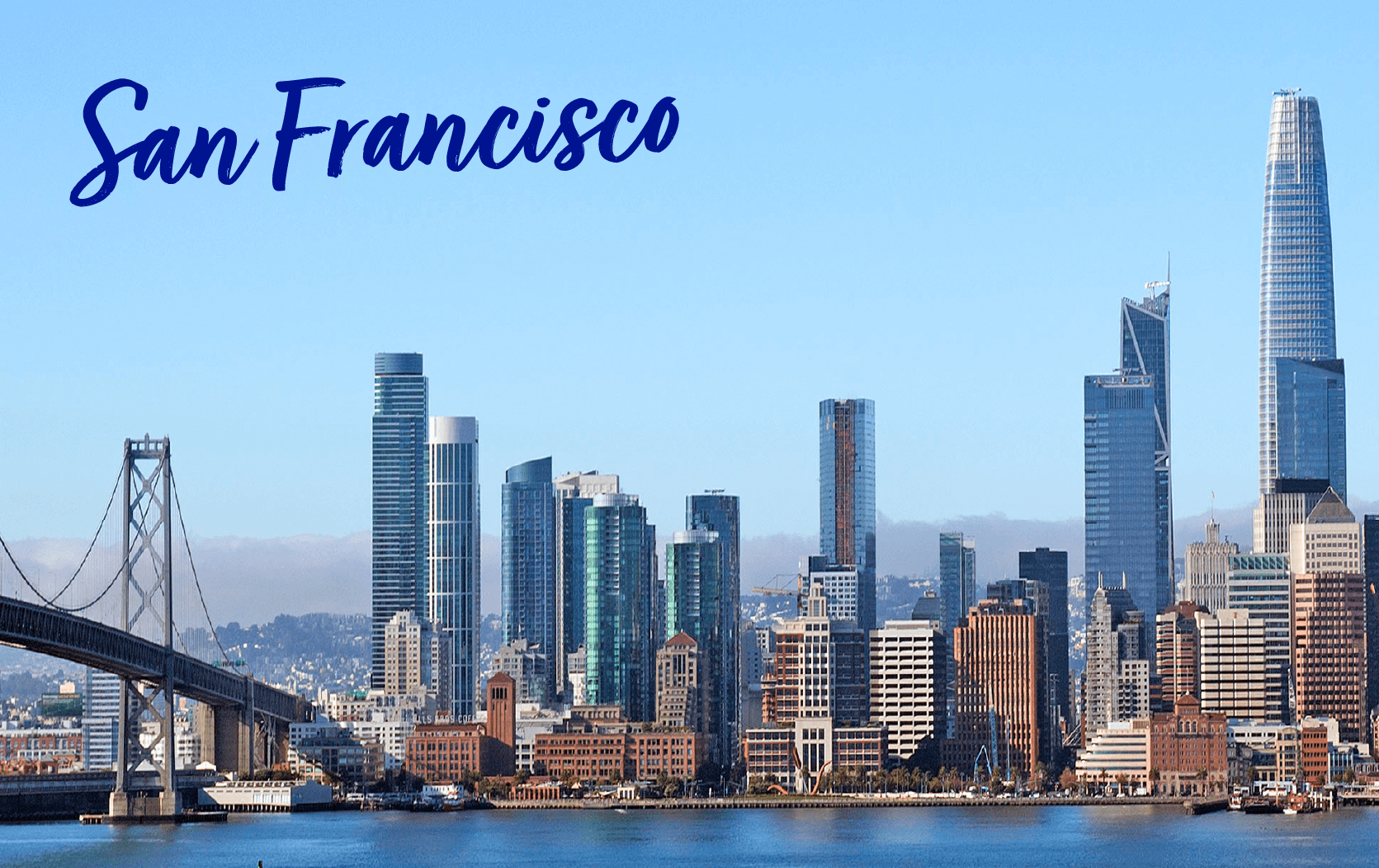 A view of the San Francisco skyline with modern skyscrapers, the Bay Bridge on the left, and "San Francisco" written in blue script at the top—perfect for Legal Week Conference attendees against a clear blue sky.
